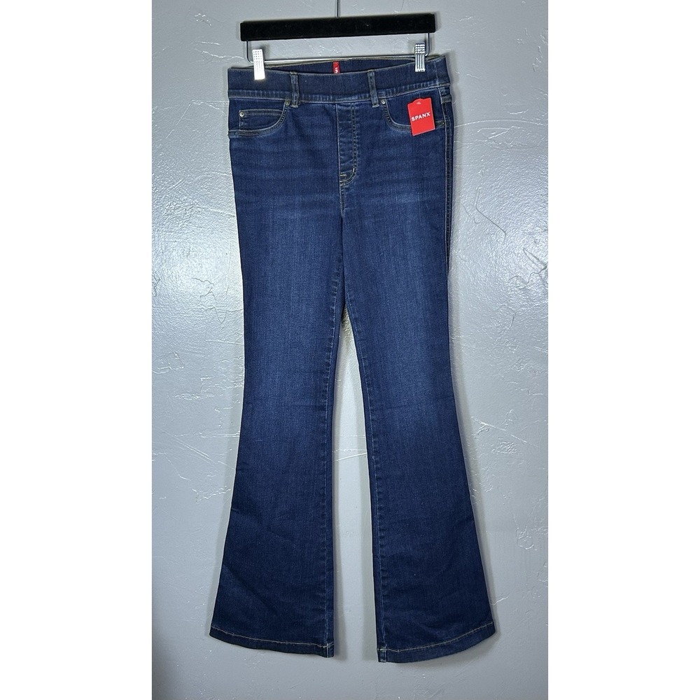 Spanx pull-on flare jeans are in a dark blue "Midnight Shade" Women's Size M